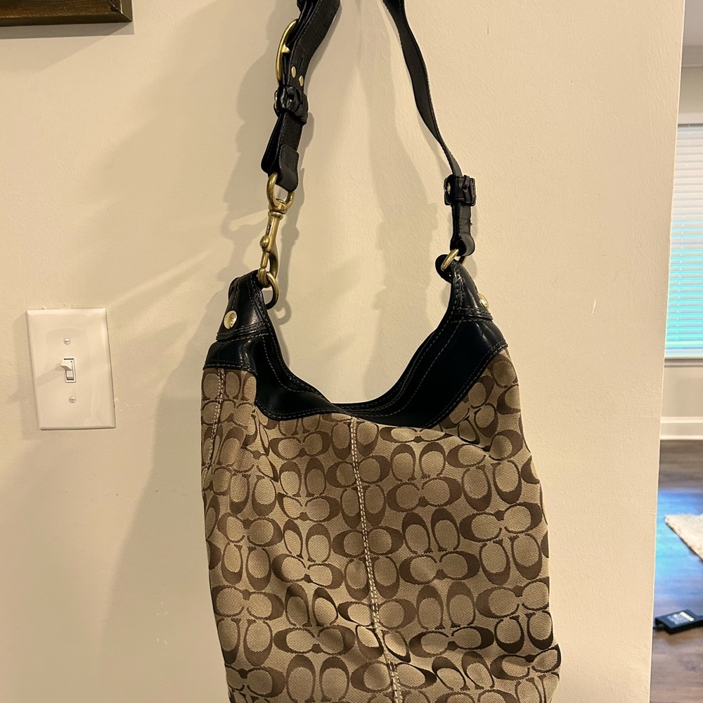 Coach purse with leather strap
